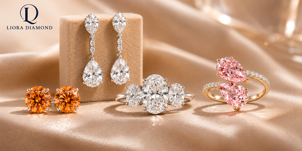 Fancy orange lab-grown diamond stud earrings, pear-shaped diamond drop earrings, a three-stone oval diamond ring, and a pink diamond toi-et-moi ring.